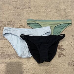 Set of Three Bikini Bottoms in Black, Green, and Light Blue